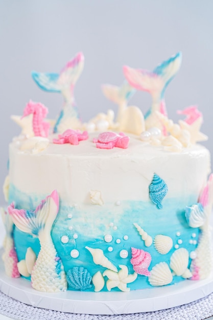 Photo mermaid themed layer vanilla cake