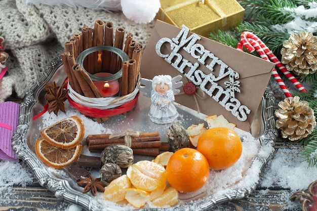 Photo merry christmas concept with gifts and christmas decorations