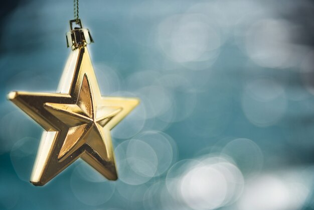 Merry Christmas concept with hanging star ornaments