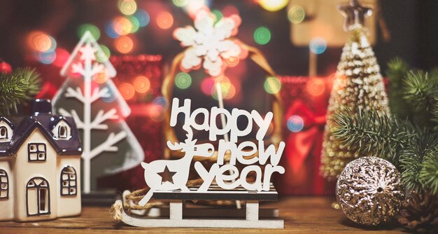 Merry Christmas and Happy Holidays , Boxes with gifts for Christmas and various attributes of holiday on a wooden background. Top view. Snow