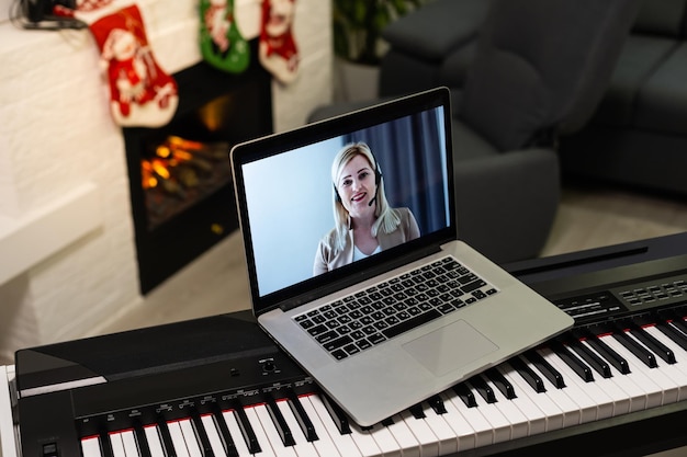 Merry Christmas and a happy. new piano and laptop at christmas time