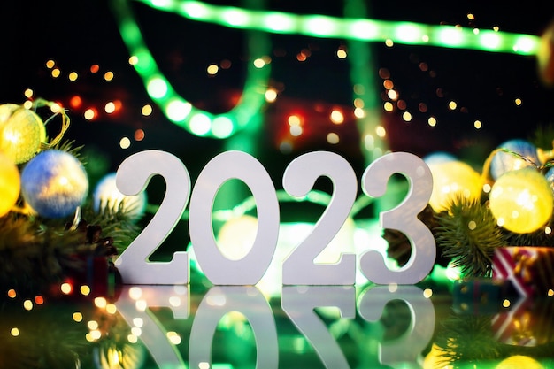 Photo merry christmas and happy new year concept bannerhappy new year 2023 a symbol from the number 2023