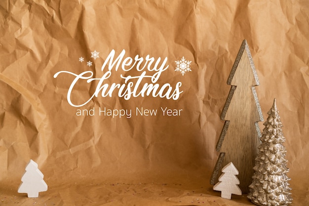Merry Christmas and Happy new year.  Craft paper with wood Christmas trees