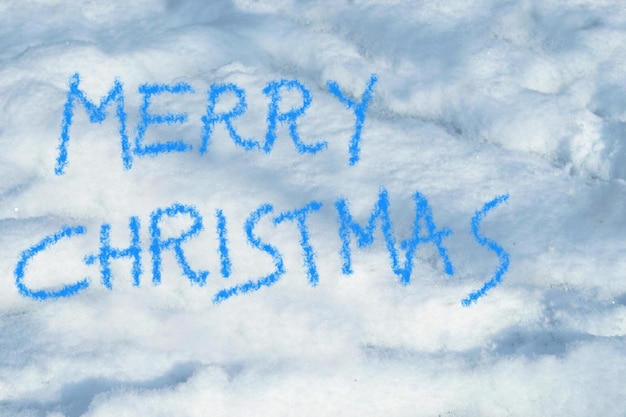 Merry christmas written in snow background