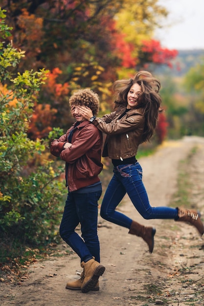 Premium Photo Merry Couple Fools Around And Shows Emotions