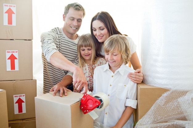 Merry family packing boxes