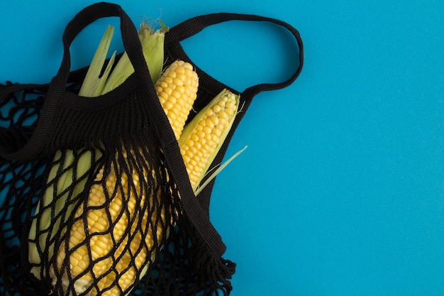 Mesh shopping bag with corn