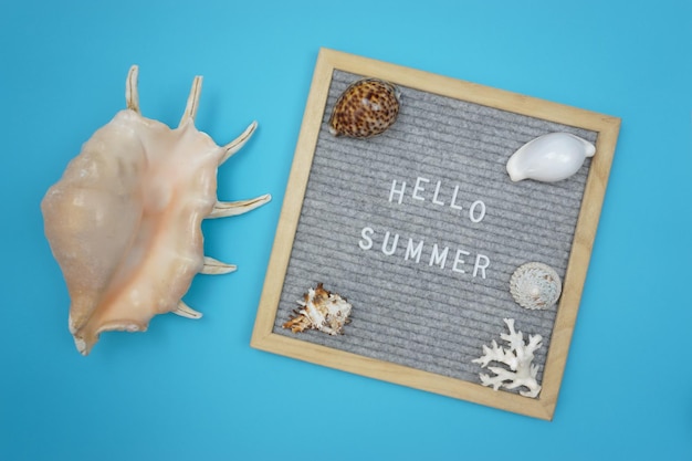 A message on a board that says hello summer