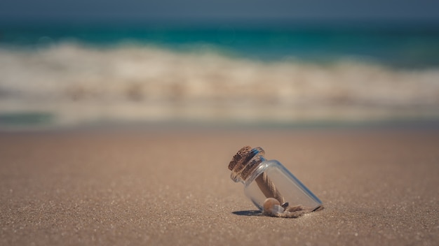 Message In Bottle On Sand Beach