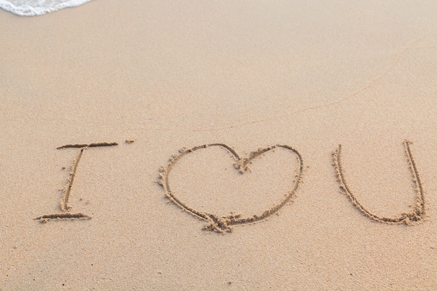 사진 모래 해변 배경에 당신을 사랑합니다 메시지