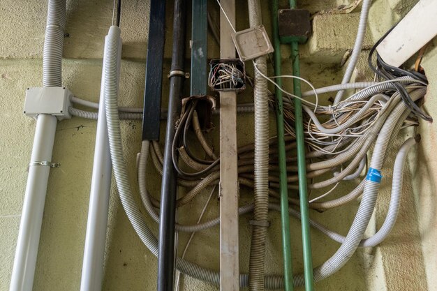 Messy and careless wiring inside of public building