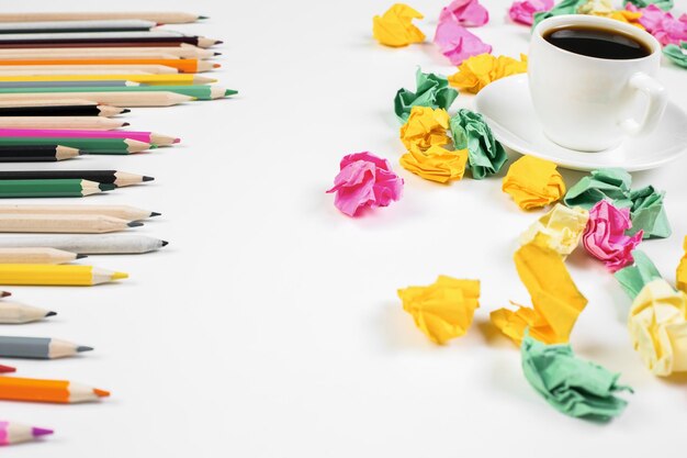 Messy white desk with supplies