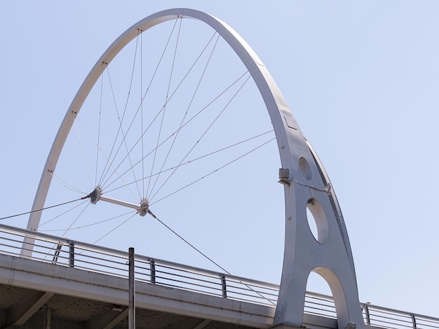 Metal arch above the bridge