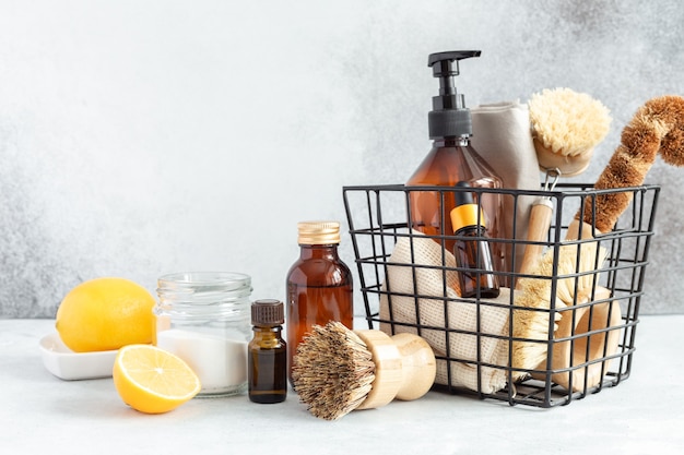 Metal basket with natural cleaning products and tools