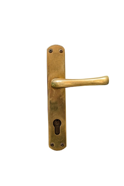 Photo metal brass old gold colored doorknob on a wooden brown door in italy
