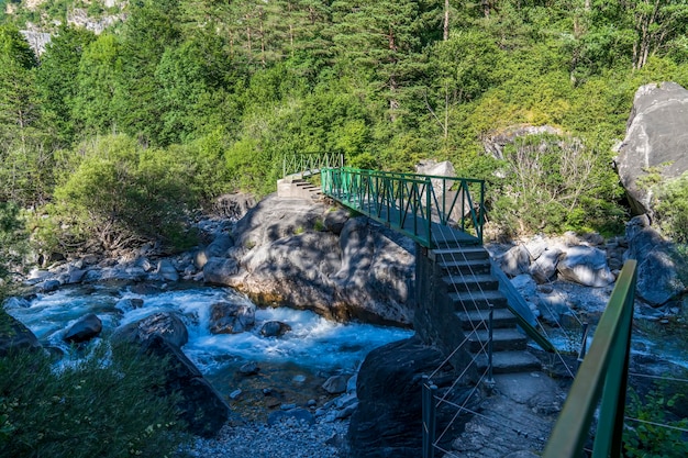 Metal bridge over the Ara River in Ordesa and Monte Perdido National Park  Aragon Huesca Spain