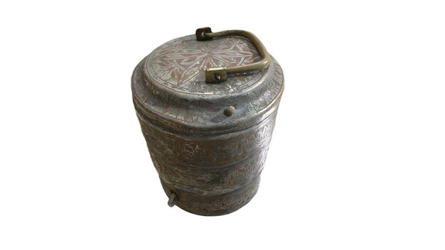 A metal bucket with a floral pattern on the lid.