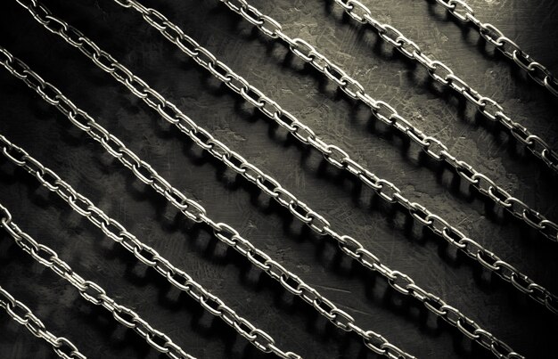 Metal chain on black background