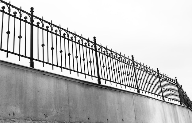 Metal fence on a concrete foundation Fence metal fencing