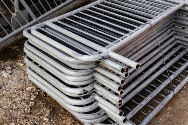 Metal fences are folded at the construction site prepared for installation Pirila for installation in a residential building