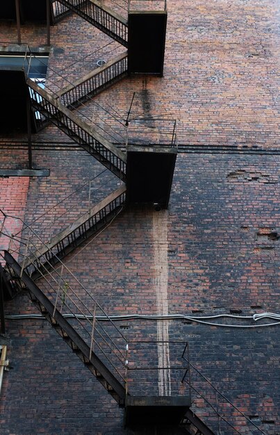 Metal fire escape on facade of old building