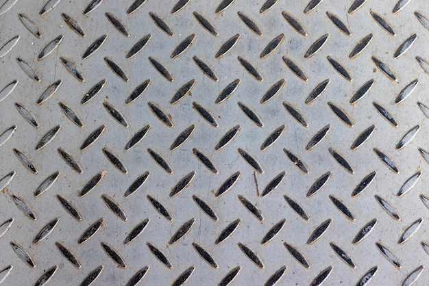 Metal floor plate with diamond pattern. Metal texture.