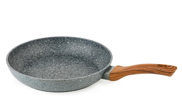 Metal frying pan with nonstick coating on white background