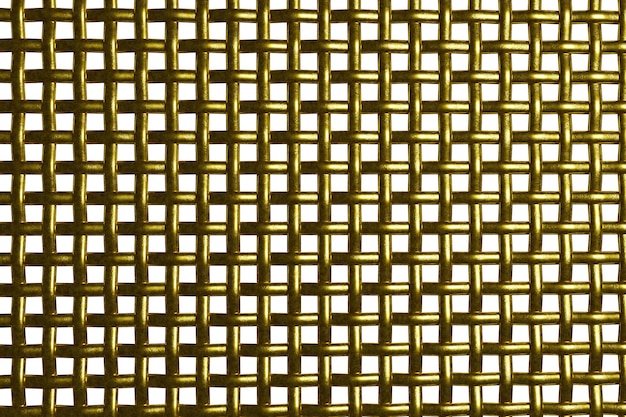 Foto griglia d'oro di metallo una recinzione fatta di maglie cellule quadrate