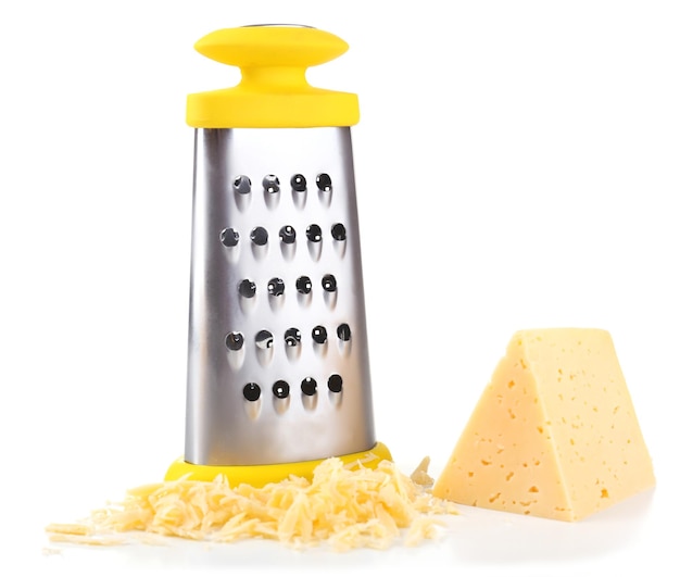 Photo metal grater and cheese isolated on white