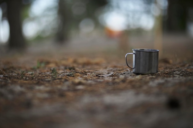 Metal hiking mug in the woods titan metal mug hike in the woods
tea or coffee time while adventur