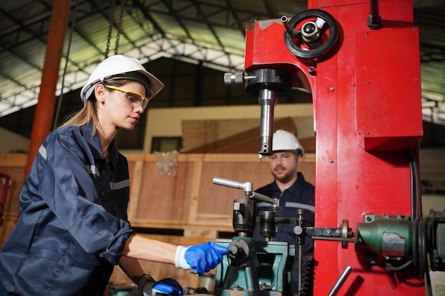 Metal industry worker at factory Business industry and lathe background