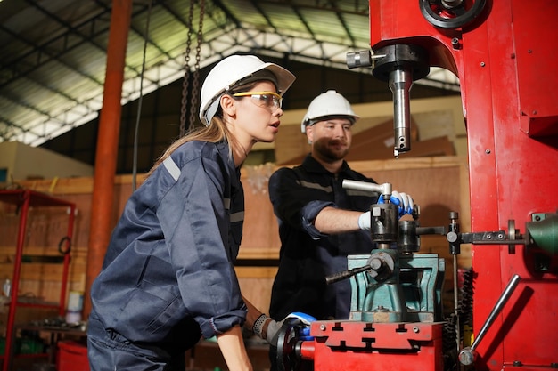 Metal industry worker at factory Business industry and lathe background