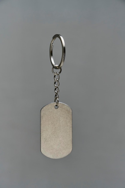 Photo metal keychain on a gray background