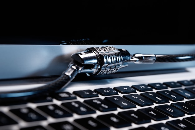 A metal laptop lock on keyboard.