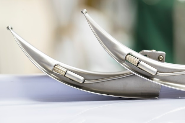 Metal laryngoscope blades