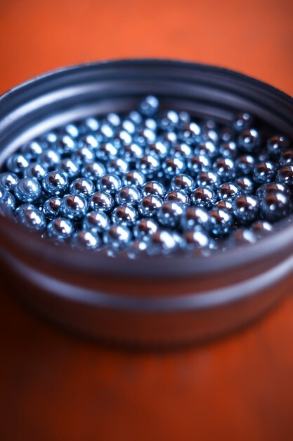 Metal marbles in plate bokeh background