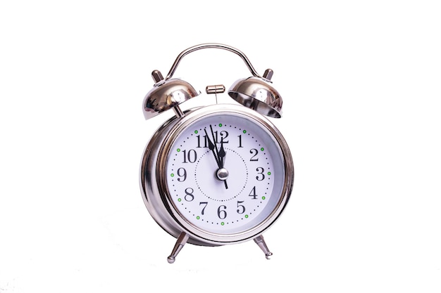 Metal retro alarm clock isolated on white background