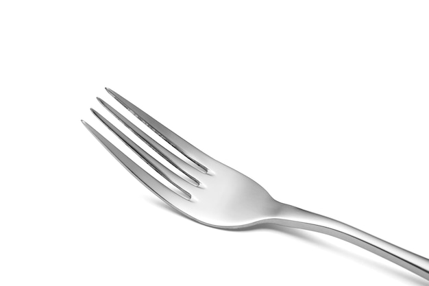 The metal shiny fork on white