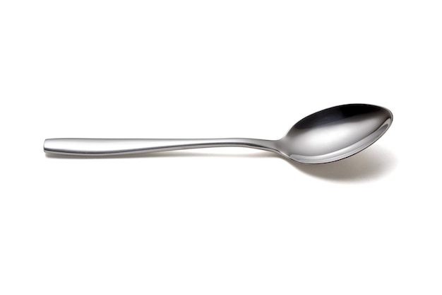 the metal shiny spoon isolated on white