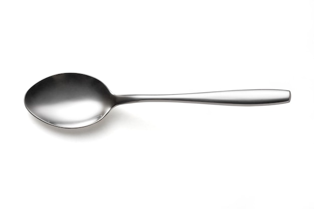 The metal shiny spoon isolated on white