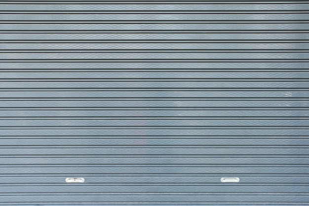 Metal shutters roll up door texture background.