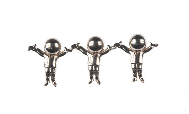 Photo metal silver toy man isolated on white background