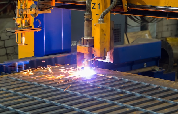 Metal sparks. Industrial laser and plasma cutting of sheet steel 