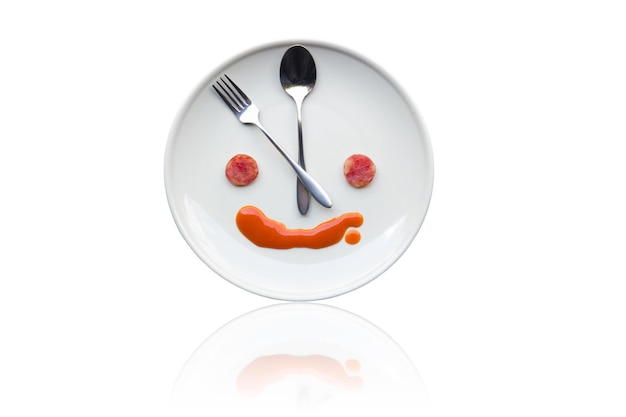 Metal spoon and fork arrange as clock face