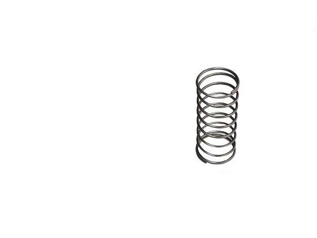 Metal spring on a white background Mechanism element