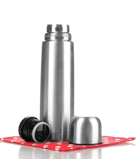 Photo metal thermos on napkin isolated on white