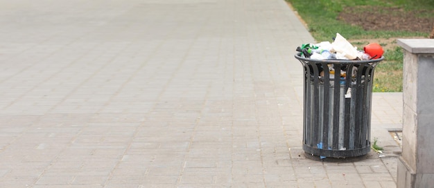 Metal trash bin in a city