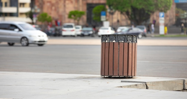 Metal trash bin in a city