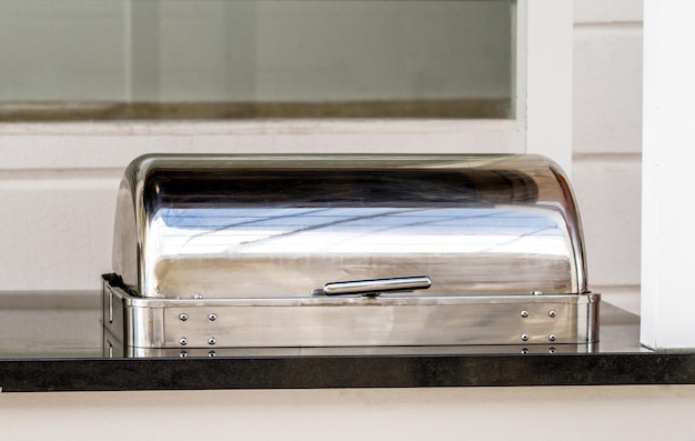 Metal trays with food in a restaurant