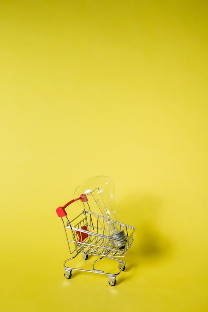 Metal trolley with a light bulb